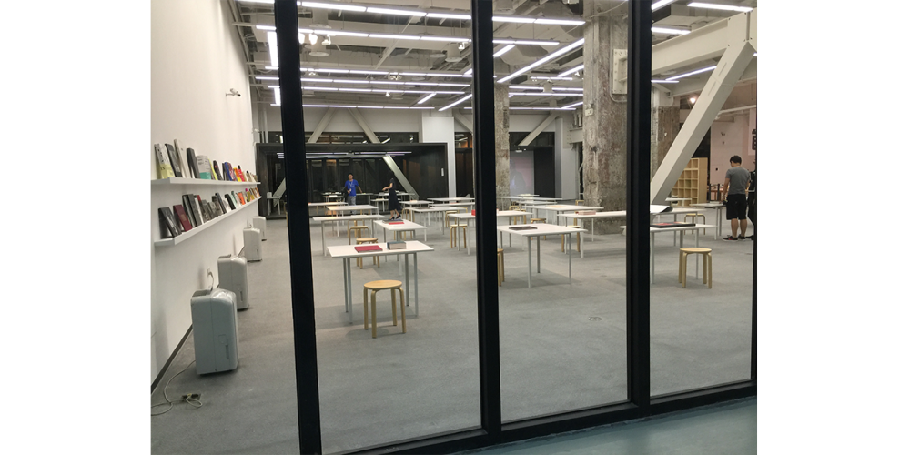 Exhibition Shanghai View into room through glass door